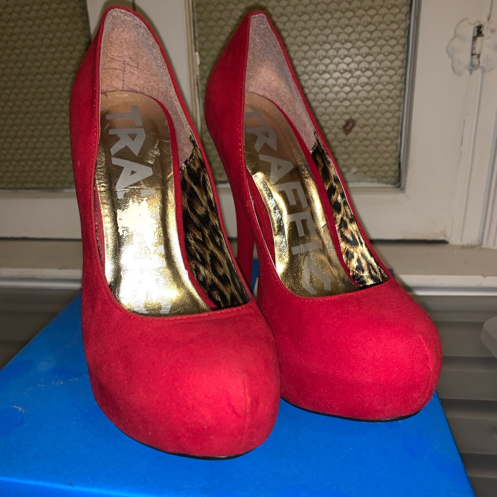 Red suede pumps